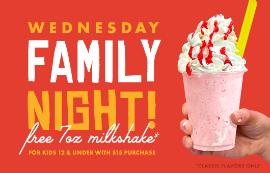 Wednesday Family Night! Free 7oz milkshakes for kids 12 and under with $15 purchase. Hand holding strawberry milkshake with whipped cream topping and strawberry drizzle